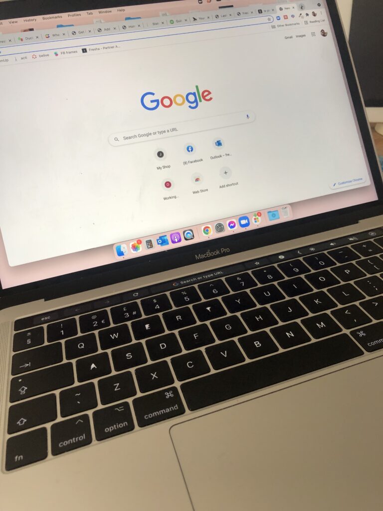 Photo of a laptop with google